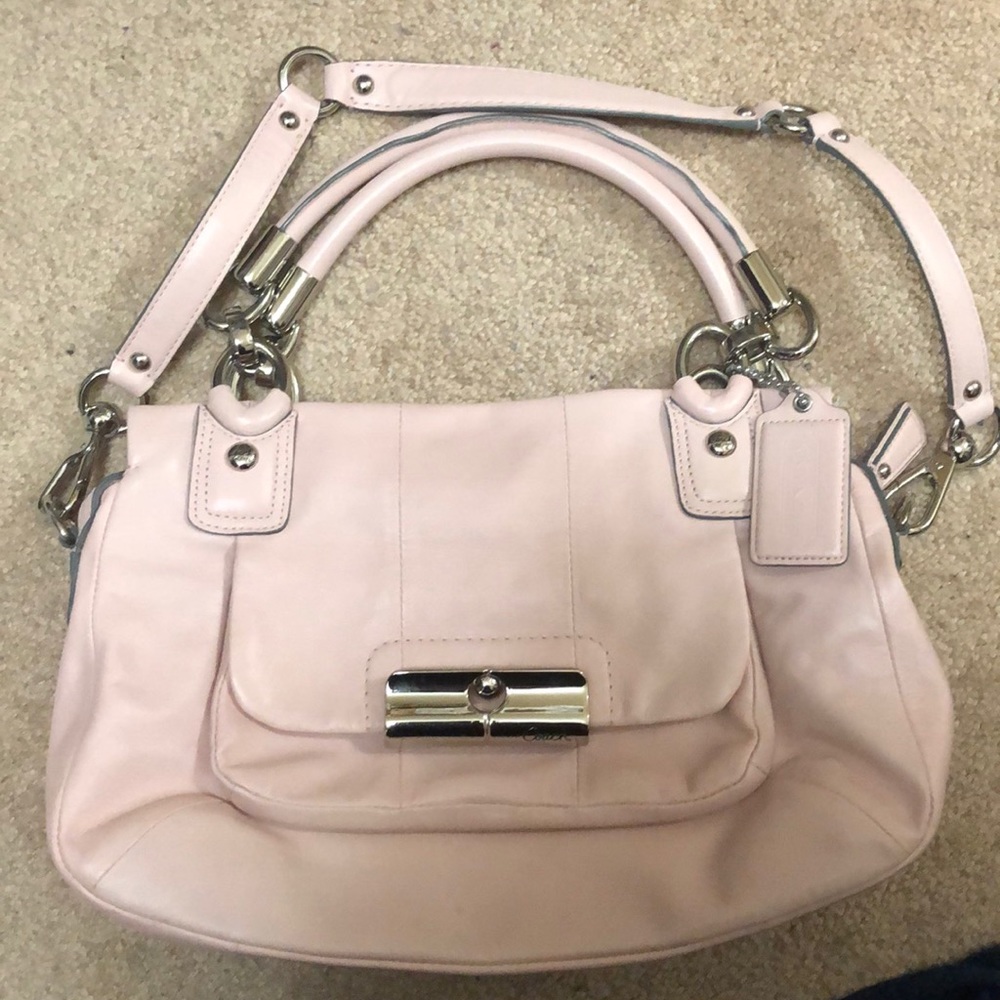 Coach bag with detachable shoulder strap.